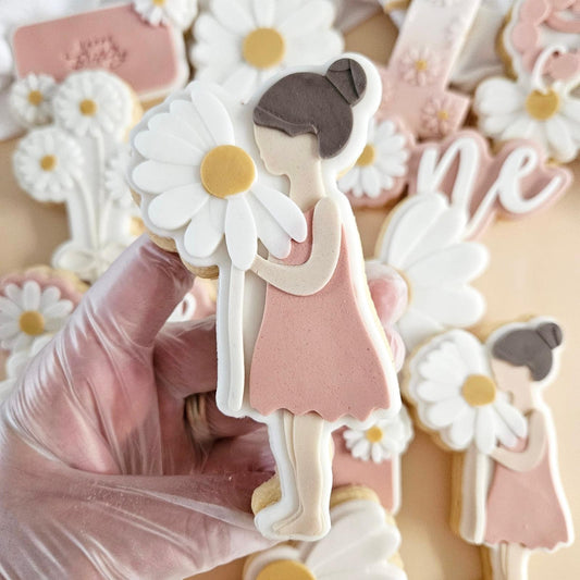 Little Girl with Daisy