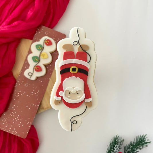 #178 - Père Noël suspendu